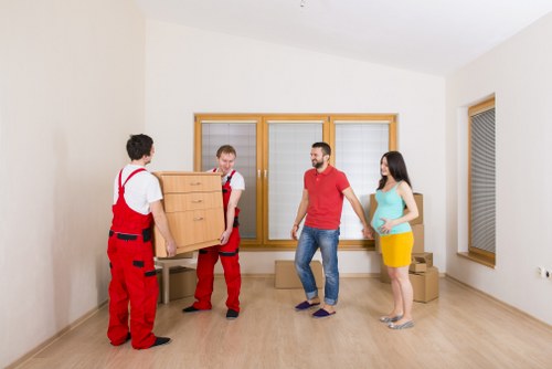 Unpacking service arranging kitchen items in a new Eastham property