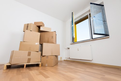 Local movers organizing fragile items for a home move in Eastham