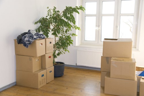 Packed boxes and household items ready for relocation