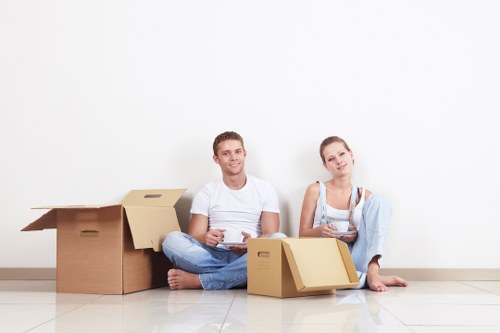 Loading household furniture into a hired removal truck