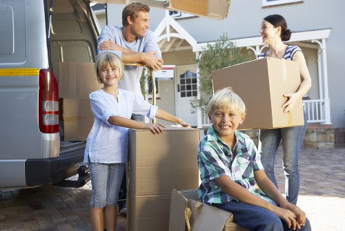 Packing and loading belongings into a removals van