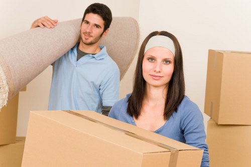 Removal team handling household furniture with care in Eastham
