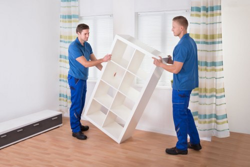 Careful furniture handling during a house move in Eastham