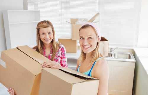 Packing and loading supplies for a moving truck in Eastham