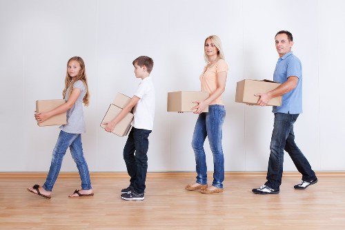 Packed office boxes and equipment prepared for relocation