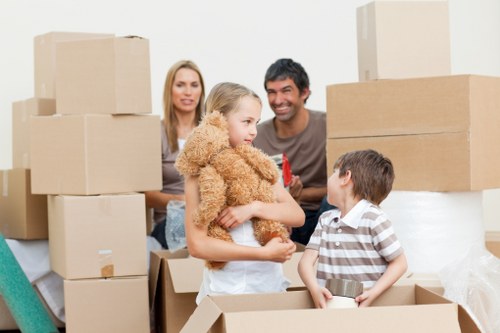 Furniture and boxes being loaded into a moving van